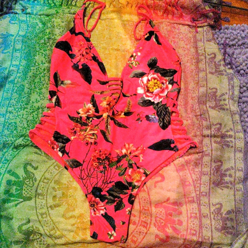 Never before worn Woman's swimsuit, TiNyBiKiNi swimwear size L